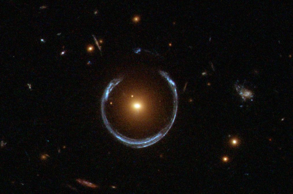 Gravitational Lensing by a composite massive black hole-subhalo system